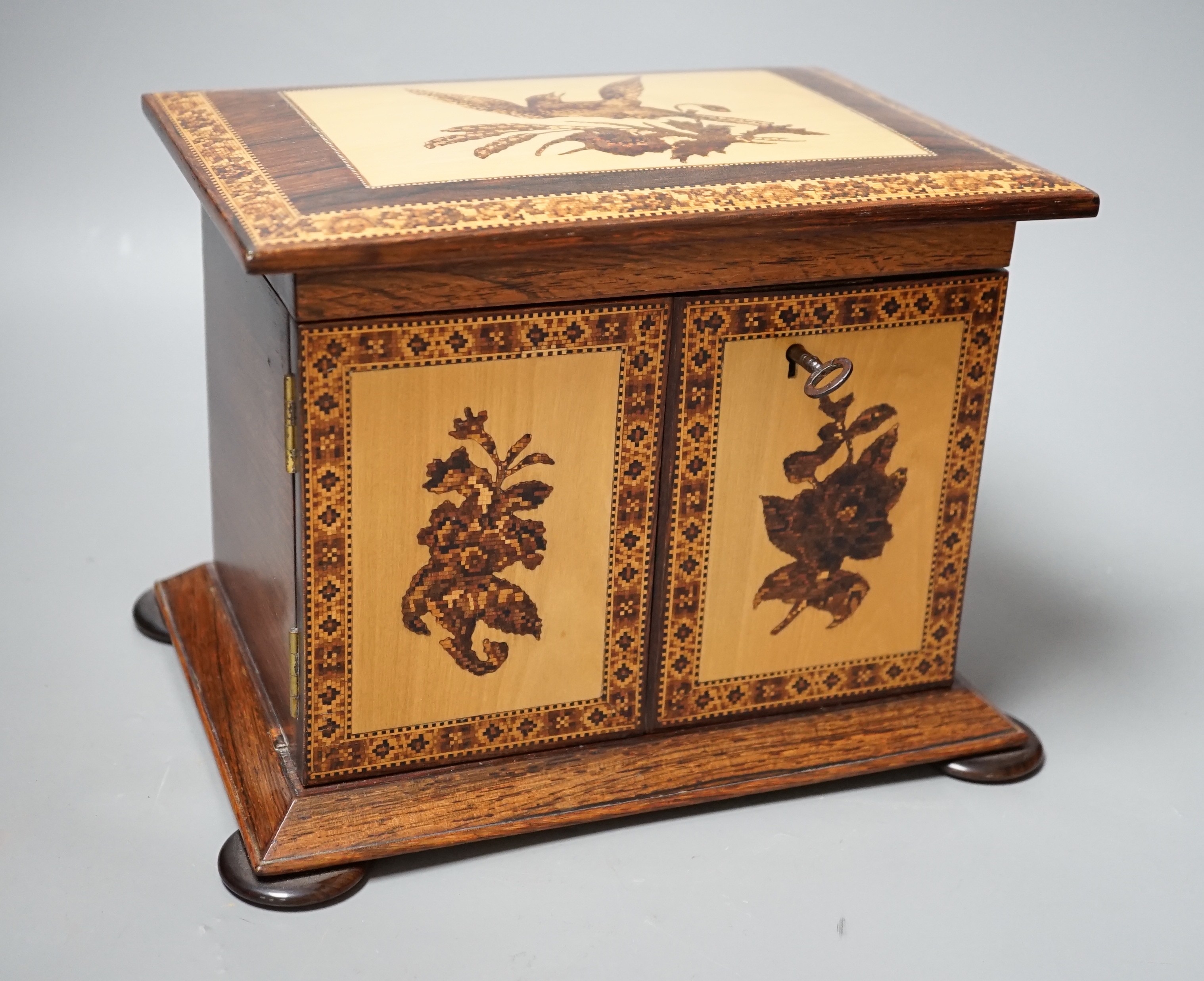 A Tunbridge ware rosewood and holly ground tesserae mosaic sewing cabinet, mid 19th century, 17.5cm high